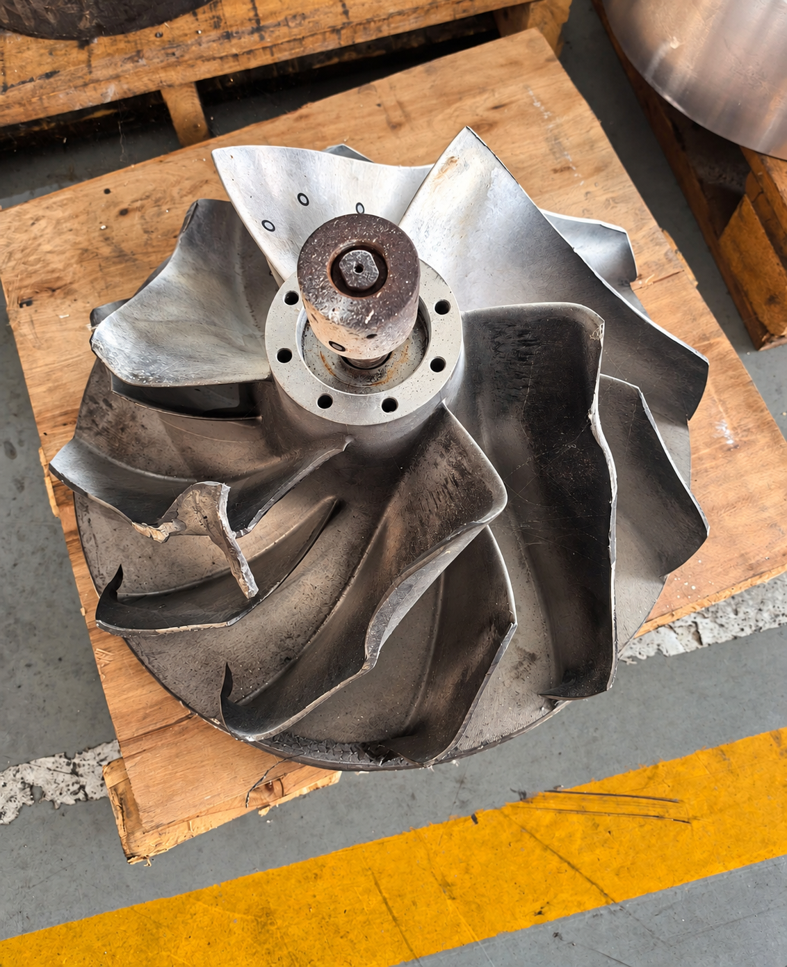 Removed impeller with visible blade damage